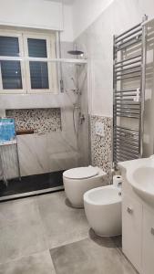 Koupelna v ubytování Relax Apartment Bergamo + 8 fotografií