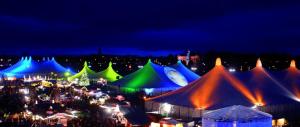 a group of tents at a festival at night at Munich Apartment 110 qm with 3 Bedrooms very cetral location 1 to 10 Guests in Munich
