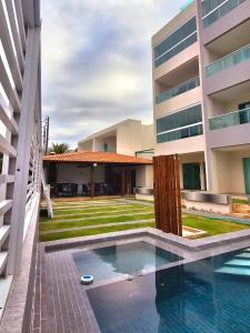Bazén v ubytování Apartamento grande de 3 quartos, a 120m das piscinas naturais de Tamandaré, a 1km do Aquaventura e a 1km da Vila Padre Arlindo nebo v jeho okolí