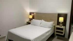 Postel nebo postele na pokoji v ubytování Apartahotel Bahia Tropical III