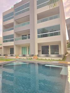 Bazén v ubytování Apartamento grande de 3 quartos, a 120m das piscinas naturais de Tamandaré, a 1km do Aquaventura e a 1km da Vila Padre Arlindo nebo v jeho okolí