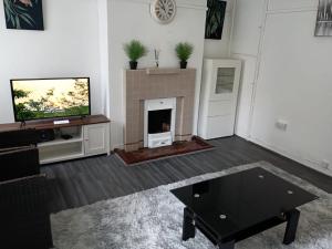 Μια τηλεόραση ή/και κέντρο ψυχαγωγίας στο The London Apartment