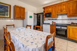 Kuchyň nebo kuchyňský kout v ubytování Migjorn + 21 fotografií