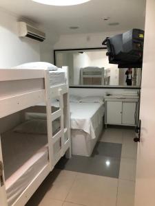 Postel nebo postele na pokoji v ubytování Hotel Laçador