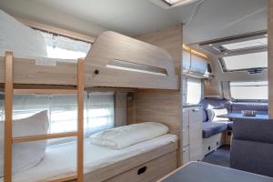 Postel nebo postele na pokoji v ubytování CAMPING SYLT am NSG Rantum-Becken