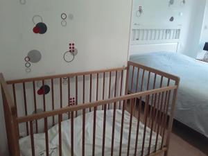 Katil atau katil-katil dalam bilik di Gîte à Condé en Normandie