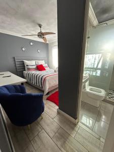 En eller flere senge i et værelse på On Wynne Guest House