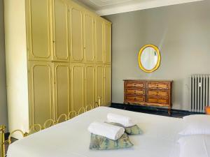 Posteľ alebo postele v izbe v ubytovaní GASTALDI ROOMS - Old Style