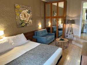Postel nebo postele na pokoji v ubytování Hotel Aneto
