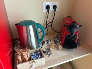 a counter with a coffee maker and a tea kettle at Studio 2 Port Valencia in Valencia +16 photos