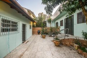 Κήπος έξω από το Casa de temporada no centro da grande Florianópolis
