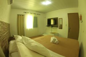 Giường trong phòng chung tại Casa da Albertina