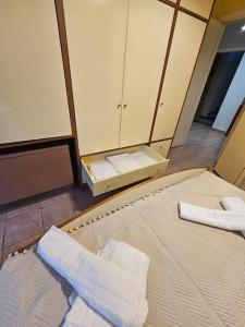 Ένα ή περισσότερα κρεβάτια σε δωμάτιο στο KT Apartment +10 φωτογραφίες