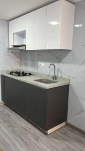 Η κουζίνα ή μικρή κουζίνα στο Elite Home Apartamentos