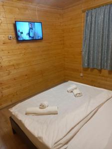 Postel nebo postele na pokoji v ubytování Нирок 2