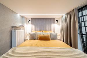 Ένα ή περισσότερα κρεβάτια σε δωμάτιο στο BalticSky Loft Premium, Apartament K o ł o b r z e g