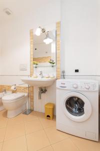 a bathroom with a washing machine and a sink at -2 Passi dal Mare- Centro Storico in Varazze +33 photos