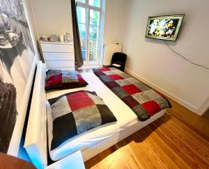 Postel nebo postele na pokoji v ubytování Doppelzimmer mit Terrasse in privatem Zuhause