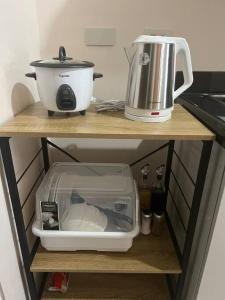 Η κουζίνα ή μικρή κουζίνα στο CebuSureStayPersimmon16thFloor3rdStudioCondoUnit