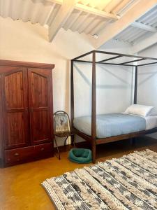 Postel nebo postele na pokoji v ubytování Casa Vermelha