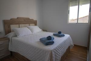 Postel nebo postele na pokoji v ubytování Apartamento Fuentesal