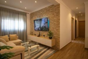 TV a/nebo společenská místnost v ubytování Apartamento Fuentesal