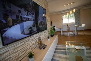 TV a/nebo společenská místnost v ubytování Apartamento Fuentesal