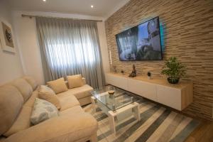 TV a/nebo společenská místnost v ubytování Apartamento Fuentesal