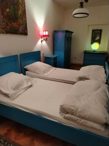 Postel nebo postele na pokoji v ubytování Alexandra