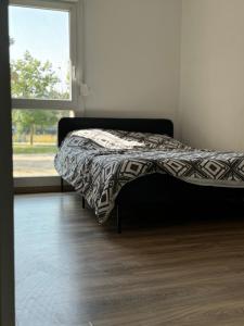 Photo de la galerie de l'établissement Appartement parking proche Dijon centre, à Longvic