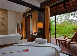 Voodi või voodid majutusasutuse Boungainvillea 7105 Luxury Apartment - Reserva Conchal toas