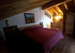 Postel nebo postele na pokoji v ubytování la cobuetta de tanta