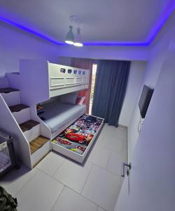 a small room with a small staircase in a house at Marassi luxury 2 bedroom in El Alamein