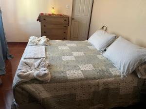 Postel nebo postele na pokoji v ubytování Habitación Quyllur Ancestral + 1 fotografie