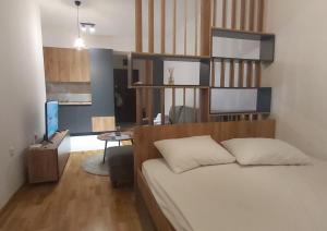 Postel nebo postele na pokoji v ubytování OpenView Apartment