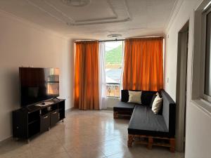 TV a/nebo společenská místnost v ubytování ApartahotelVacacionalSangil