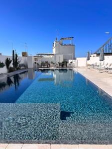 The swimming pool at or close to Appartamento Magnolia Deluxe