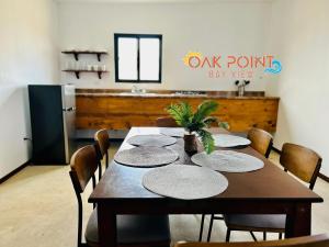 a table with plates on it in a kitchen at Oak Point Bay View in Ensenada