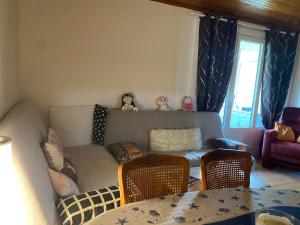 Posezení v ubytování Appartement dans résidence calme