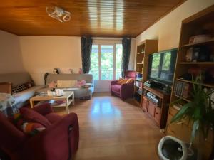 TV a/nebo společenská místnost v ubytování Appartement dans résidence calme