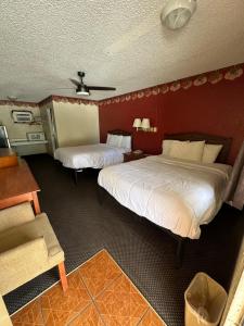 Ένα ή περισσότερα κρεβάτια σε δωμάτιο στο Hico Hills Inn