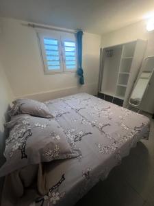 Postel nebo postele na pokoji v ubytování Logement Campagne Coquelicots Plaisance