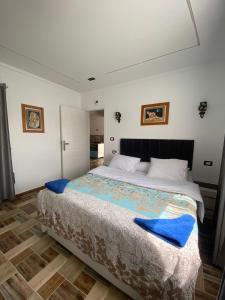 Ένα ή περισσότερα κρεβάτια σε δωμάτιο στο Villa golden life apartments, new property with pool access