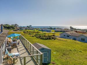 a view of the beach from the deck of a house at Bodega Bay Oasis A Wine Country Escape in Bodega Bay