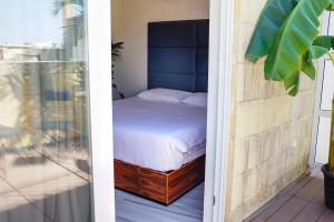 Postel nebo postele na pokoji v ubytování Valhalla Boutique Hotel