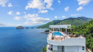 an aerial view of a building overlooking the water at Blue Horizon Luxury Condo in Puerto Vallarta