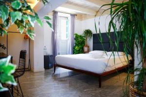 Postel nebo postele na pokoji v ubytování Valhalla Boutique Hotel
