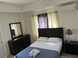 Postel nebo postele na pokoji v ubytování Chambers resident suite