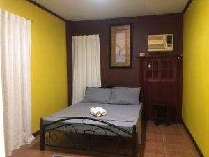 Llit o llits en una habitació de Maeganbeverly's Place 5 fotos més