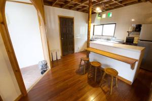 Kuchyň nebo kuchyňský kout v ubytování Katy's OKINAWA A